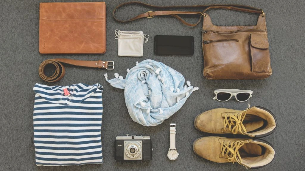 A leather travel bag and accessories